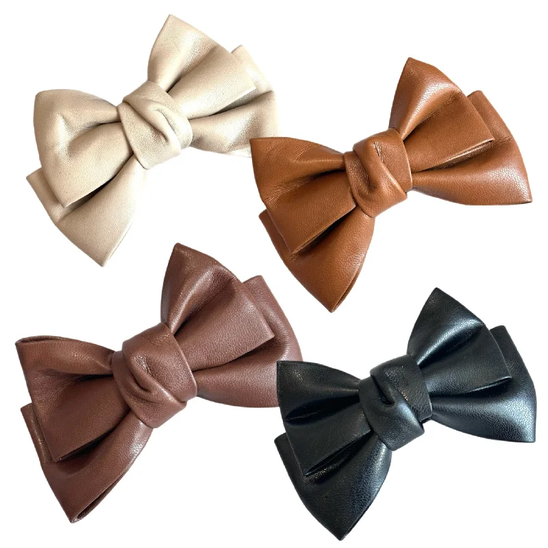 Holiday Drinkware Offers Faux Leather Tumbler Bow